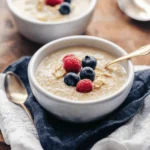 Cream of Wheat Recipe: The Ultimate Comforting Bowl You’ll Love 2 Bowl of creamy Cream of Wheat topped with fresh raspberries and blueberries.