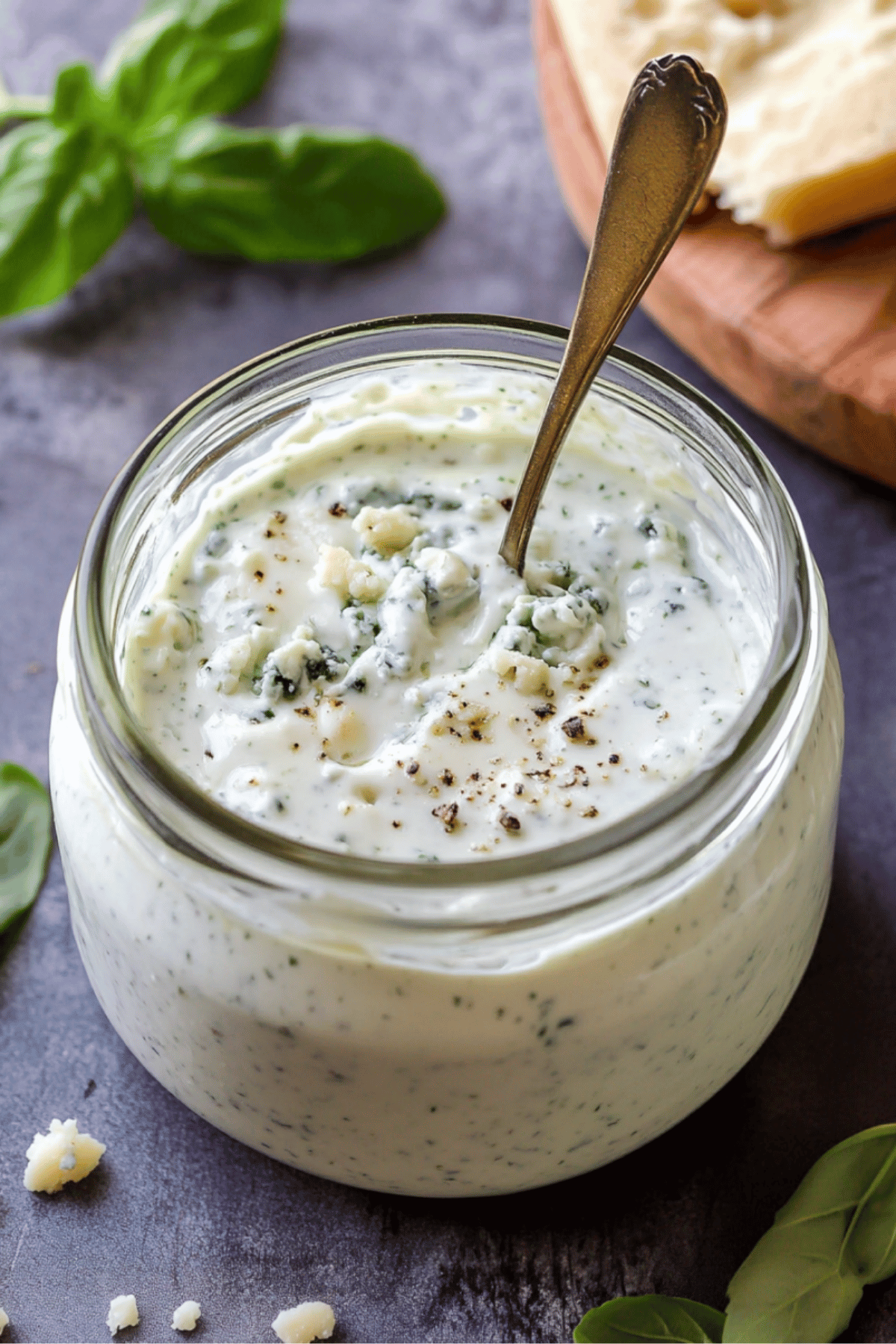 Chunky Style Blue Cheese Dressing Chunky blue cheese dressing in a jar topped with crumbles